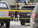 EPS members investigate the scene of an officer-involved shooting in the area of ​​105 Street and 38 Avenue on Sunday, March 13, 2022.