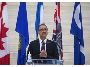 Amarjeet Sohi announces the creation of a permanent COVID-19 memorial and future plans to recognize the experiences and loss that these past two years have brought us, at City Hall on March 26, 2022.