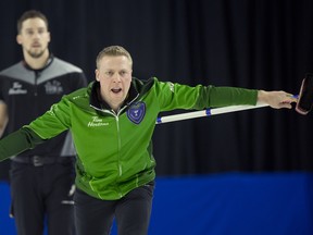 Team Saskatchewan skip Colton Flasch waves off his front end during a page playoff game against team Wild Card 1 skip Brad Gushue on Saturday, March 12, 2022, in Lethbridge.