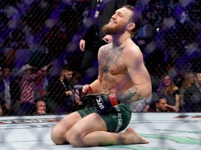 Conor McGregor celebrates his first round TKO victory against Donald Cerrone in a welterweight bout during UFC246 at T-Mobile Arena on January 18, 2020 in Las Vegas, Nevada.