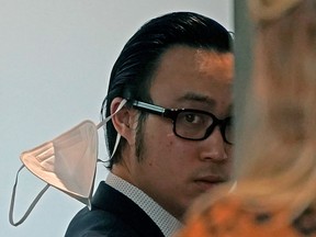 Thomas Dang, Independent MLA for Edmonton South, leaves a news conference on March 22, 2022, after releasing a White Paper calling on the UCP government of Alberta to improve its cybersecurity protocols.