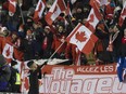 Team Canada celebrates after defeating Team Mexico 2-1 at the FIFA 2022 World Cup qualifier at Commonwealth Stadium on Nov. 16, 2021, in Edmonton.