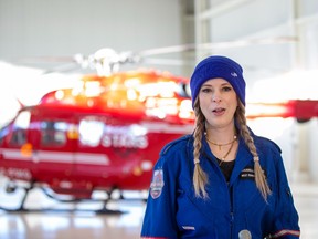 Danielle Woo, General Manager, West Edmonton Mall speaks to the media before being airlifted by STARS helicopter to a remote location in Devon where they must raise enough money to secure their flight back to the airport. Taken on Thursday,March  24, 2022 in Edmonton.