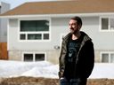 Jarrod English poses for a photo outside his home in Edmonton's Mill Woods neighbourhood, on Thursday March 17, 2022. English just sold his home for nearly $34K over asking after he received 14 offers.