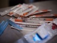Needles are pictured at a safe injection site in Surrey, British Columbia on December 17, 2017.