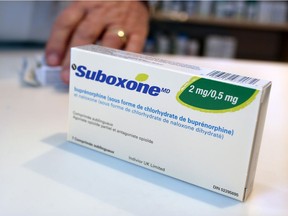 Pharmacist Kent Wood prepares a prescription of Suboxone in the pharmacy in Standoff, Alberta on Tuesday February 28, 2017.