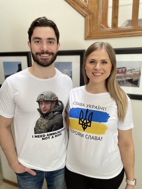 Natalia Kostiuk and Dylan Cliff wear the t-shirts they sell to support the Friends of Ukraine Defense Forces Fund. T-shirts available at Standwithukraineproject@gmail.com