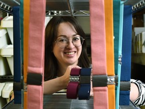 Claire Theaker-Brown at her company UnBelts, with two of her belts that appeared on the Oscars red carpet a few weeks ago.