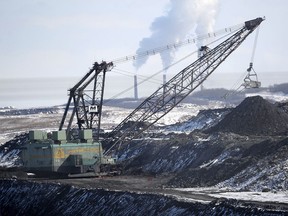 FILE PHOTO: A giant drag line works in the Highvale Coal Mine to feed the nearby Sundance Power Plant near Wabamun on Friday, Mar. 21, 2014.