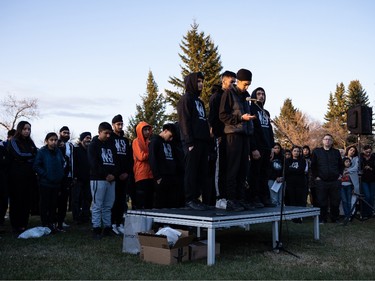 Friends speak in memory of Karanveer Sahota who was beaten and stabbed to death outside McNally High School, during a vigil outside his school in Edmonton, on Friday, April 29, 2022.
