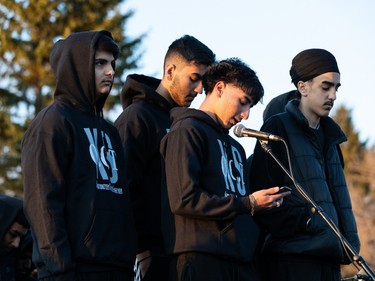 Friends speak in memory of Karanveer Sahota who was beaten and stabbed to death during a candlelight vigil outside McNally High School in Edmonton, on Friday, April 29, 2022.