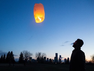 Family and friends released lanterns for Karanveer Sahota, who was beaten and stabbed to death outside McNally High School, during a vigil outside his school in Edmonton, on Friday, April 29, 2022.