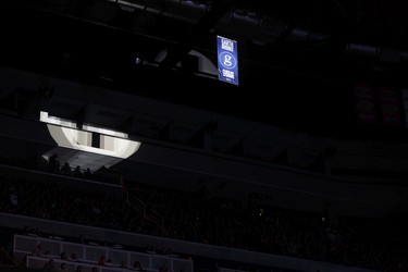 A Garth Brooks banner is revealed in the rafters during a special presentation for the 5 millionth Garth Brooks ticket sold on stage at Rogers Place in Edmonton on Friday, February 24, 2017.