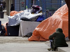 A homeless encampment on 100 Street near 107 Avenue in downtown Edmonton on Friday April 22, 2022. Last year, there were 6,200 calls to 311 about encampments compared to 790 in 2016.