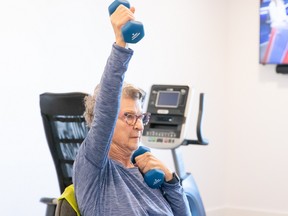 Resident Terry Krissie loves the workout room at Harmony at Rutherford.