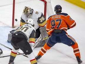 Edmonton Oilers Connor McDavid (97) can?t get the puck past Vegas Golden Knights goalie Logan Thompson (36) during first period NHL action on Saturday, April 16, 2022 in Edmonton.