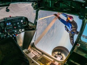 Luke Aikins went from piloting one aircraft to another, after he skydived from the first aircraft to the second, regaining control and landing it safely on April 24, in Eloy, Arizona.