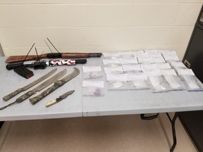 RCMP seized quantities of methamphetamine and fentanyl as well as two sawed-off shotguns, machetes, knives and more after responding to a report of an impaired driver south of Hinton on Monday, April 25, 2022.