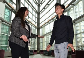 Freshman Aftikhar Mominzada, right, from Afghanistan, comes to study here with Khadija Jetha, international recruitment coordinator at the University of Alberta in Edmonton, April 21, 2022. Ed Kaiser/Postmedia