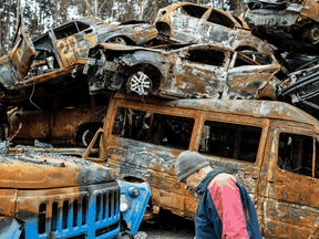 Daily images of destruction - such as the one above taken Tuesday in Irpin, near Kyiv - can leave a dark impression, mental health experts say, even if the viewer is as far removed from the chaos as a Canadian is from Ukraine.