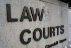 Photo of Edmonton Law Courts sign.