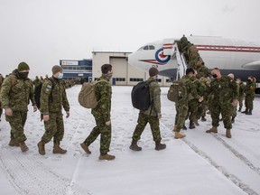 Approximately 80 Canadian Armed Forces (CAF) members, primarily from 1 Field Ambulance and Third Battalion, Princess Patricia's Canadian Light Infantry, both based in Edmonton, load unto a C-150 Polaris, to join the CAF troops already deployed in support of NATO in Eastern and Central Europe under Operation REASSURANCE on Friday, April 15, 2022 in Edmonton.