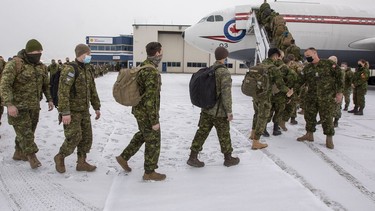 Approximately 80 Canadian Armed Forces (CAF) members, primarily from 1 Field Ambulance and Third Battalion, Princess Patricia's Canadian Light Infantry, both based in Edmonton, load unto a C-150 Polaris, to join the CAF troops already deployed in support of NATO in Eastern and Central Europe under Operation REASSURANCE on Friday, April 15, 2022 in Edmonton.