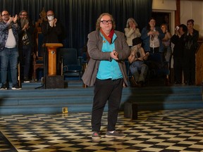 Fashion designer Stanley Carroll receives a standing ovation following Flight, his spring collection shown April 29 at Acacia Hall.