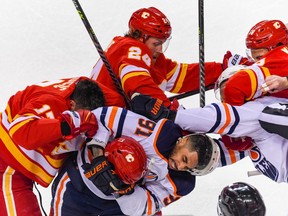 Calgary Flames Milan Lucic and Edmonton Oilers Evander Kane get into a fight during the first period of the first game of the second round of play-off action at Scotiabank Saddledome on Wednesday, May 18, 2022.