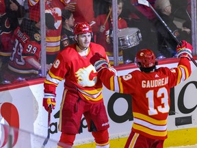 Calgary Flames Matthew Tkachuk and Johnny Gaudreau celebrate a goal against Edmonton Oilers during the second period of the first game of the second round of playoff action at Scotiabank Saddledome on Wednesday, May 18, 2022.