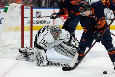 Edmonton Oilers' Kailer Yamamoto (56) stick handles in front of L.A. Kings' goaltender Jonathan Quick (32) during first period NHL action in Game 2 of their first round Stanley Cup playoff series in Edmonton, on Wednesday, May 4, 2022.