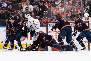 Edmonton Oilers' goaltender Mike Smith (41) makes a save on L.A. Kings' Quinton Byfield (55) during first period NHL action in Game 2 of their first round Stanley Cup playoff series in Edmonton, on Wednesday, May 4, 2022.