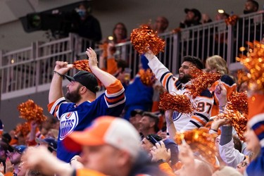 Edmonton Oilers fans cheer as the team battles the L.A. Kings during first period NHL action in Game 2 of their first round Stanley Cup playoff series in Edmonton, on Wednesday, May 4, 2022.