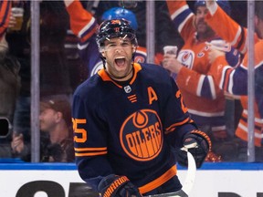 Edmonton Oilers' Darnell Nurse (25) celebrates a goal with teammates on L.A. Kings' goaltender Jonathan Quick (32) during second period NHL action in Game 2 of their first round Stanley Cup playoff series in Edmonton, on Wednesday, May 4, 2022. Photo by Ian Kucerak