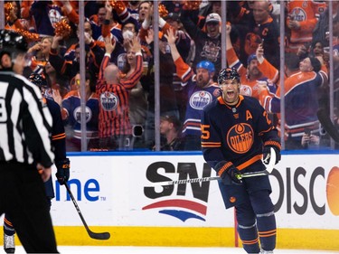 Edmonton Oilers' Darnell Nurse (25) celebrates a goal with teammates on L.A. Kings' goaltender Jonathan Quick (32) during second period NHL action in Game 2 of their first round Stanley Cup playoff series in Edmonton, on Wednesday, May 4, 2022.