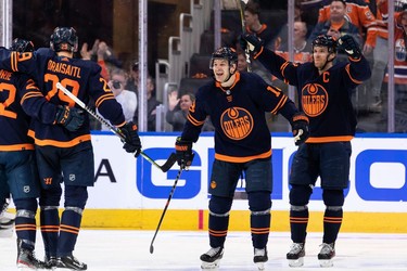 Edmonton Oilers' Leon Draisaitl (29) celebrates a goal with teammates on L.A. Kings' goaltender Jonathan Quick (32) during second period NHL action in Game 2 of their first round Stanley Cup playoff series in Edmonton, on Wednesday, May 4, 2022.