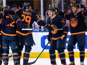 Edmonton Oilers' Leon Draisaitl (29) celebrates a goal with teammates on L.A. Kings' goaltender Jonathan Quick (32) during second period NHL action in Game 2 of their first round Stanley Cup playoff series in Edmonton, on Wednesday, May 4, 2022.