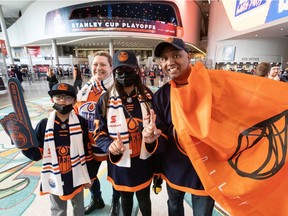 The Maharaj family, including (left to right) Jaiden Maharaj, Janelle, Maya, and Anil wore their best Edmonton Oilers colours out to watch Game 3 of Round 1 between the Edmonton Oilers and the Los Angeles Kings during a watch party held inside Rogers Place in Edmonton, on Friday, May 6, 2022. Photo by Ian Kucerak