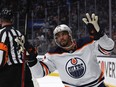 LOS ANGELES, CALIFORNIA - MAY 12: Evander Kane #91 of the Edmonton Oilers celebrates his empty net goal behind referee Frederick L'Ecuyer #17 during the third period in a 4-2 Oilers win in Game Six of the First Round of the 2022 Stanley Cup Playoffs at Crypto.com Arena on May 12, 2022 in Los Angeles, California.