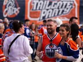 Oilers fans gather for the Ford Tailgate Party outside of Rogers Place to watch Game 7 of the NHL Stanley Cup playoffs series between the Edmonton Oilers and the L.A. Kings in Edmonton, on Saturday, Nov. 14, 2022.