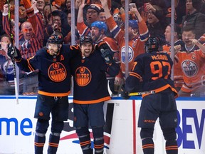 Edmonton Oilers' Cody Ceci (5) celebrates a goal with teammates on L.A. Kings' goaltender Jonathan Quick (32) during second period NHL Stanley Cup playoffs action at Rogers Place in Edmonton, on Saturday, May 14, 2022.
