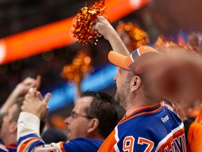 Edmonton Oilers fans cheer as the team plays the L.A. Kings during second period NHL Stanley Cup playoffs action at Rogers Place in Edmonton, on Saturday, May 14, 2022.