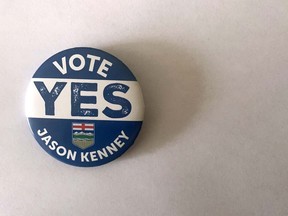 A souvenir button available to Jason Kenney supporters at an event at Spruce Meadows in Calgary on Thursday, May 19, 2022 is displayed. During a speech to supporters, Kenney announced that the was stepping down as the leader of the UCP.