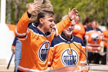 Oilers alumni Dwayne Roloson leads a cheer during an Edmonton Oilers fan rally held at Sir Winston Churchill Square to cheer the Oilers' playoff journey with the rest of the city in Edmonton on Tuesday, May 24, 2022. The Oilers face the Calgary Flames in Game 4 of the Battle of Alberta series at Rogers Place tonight.