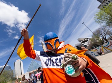 Mandalorian Tyler Mike and Grogu dressed up for an Edmonton Oilers fan rally held at Sir Winston Churchill Square cheer they cheer the Oilers' playoff journey with the rest of the city in Edmonton on Tuesday, May 24, 2022. The Oilers face the Calgary Flames in Game 4 of the Battle of Alberta series at Rogers Place tonight.