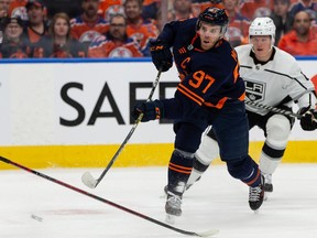 Edmonton Oilers' Connor McDavid (97) scores on L.A. Kings' goaltender Jonathan Quick (32) during first period of NHL playoff action at Rogers Place in Edmonton, on Monday, May 2, 2022. Photo by Ian Kucerak