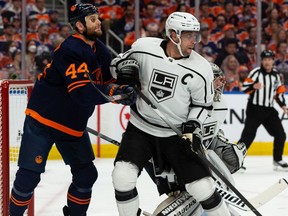 Edmonton Oilers' Zack Kassian (44) battles L.A. Kings' Anze Kopitar (11) during first period of NHL playoff action at Rogers Place in Edmonton, on Monday, May 2, 2022. Photo by Ian Kucerak