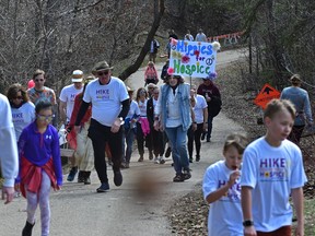 Walkers taking part in the Hospice Pilgrim Hike which is part of the Canadian Hospice Palliative Care Association's national event supporting end-of-life care and bereavement support to raise over $65,000 with this event, to support residential care in the greater Edmonton community, April 30, 2022. Ed Kaiser/Postmedia