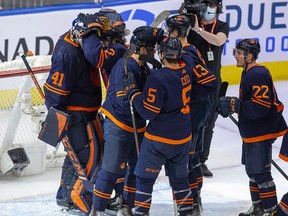 Edmonton Oilers celebrate their 4-1 victory over the Calgary Flames after NHL second round playoff hockey action on Sunday, May 22, 2022 in Edmonton.