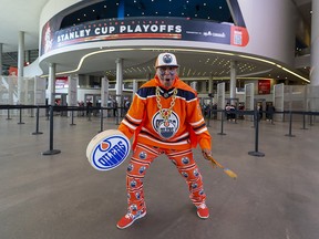 Blair Gladue, better known as Superfan Magoo on social media, torys to get Edmonton Oilers fans coming into Rogers Place pumped up as they wait for the start of Game 6 between the Oilers and Los Angeles Kings. Taken on Thursday, May 12, 2022 in Edmonton.